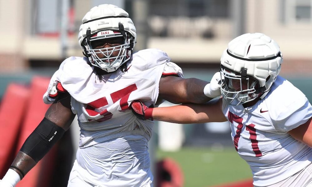 Alabama OL Elijah Pritchett (#57) going through positional drills during Crimson Tide's 2024 fall camp practice.