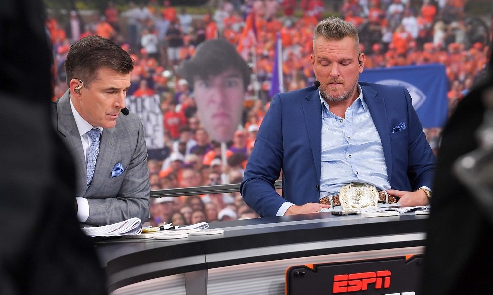 Rece Davis, College GameDay Host and Pat McAfee, College Football Analyst pause watching a segment about Ella Bresee during ESPN College GameDay Built by The Home Depot on Bowman Field at Clemson University in Clemson Saturday, October 1, 2022.