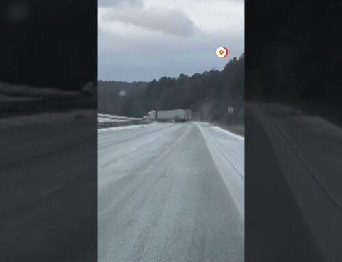 Truck spins out, crashes on icy Alabama highway