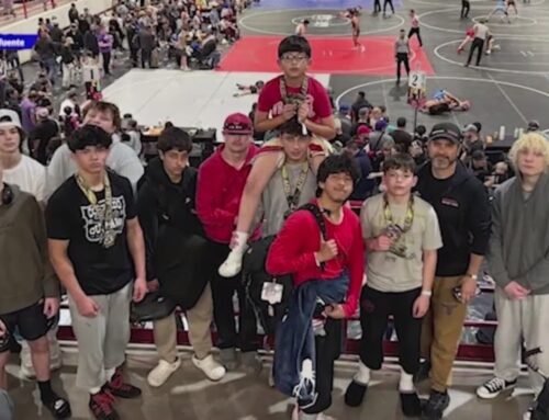 Former member says wrestling team will overcome bus crash