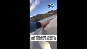 Alaska state trooper uses surfboard to rescue teen who fell through ice