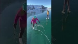 Frozen Alaska lake turns into see-through ice skating rink