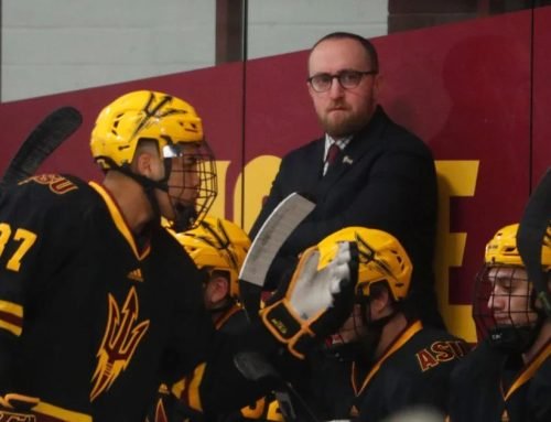 Arizona State hockey head coach Greg Powers watches his team as they …