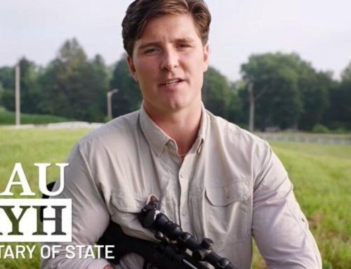 Bayh touts Marines service in 1st ad for secretary of state