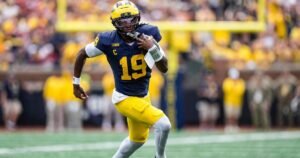 Michigan quarterback Bryce Underwood (19) runs against Oklahoma durin…