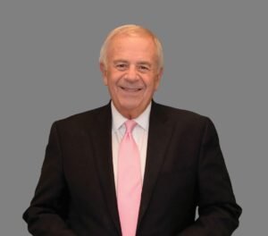 Pennella exits the stage as Grand’s executive director