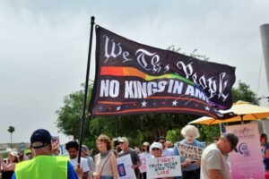 ‘Without those checks, he’s a king’: Thousands rally across Arizona a…